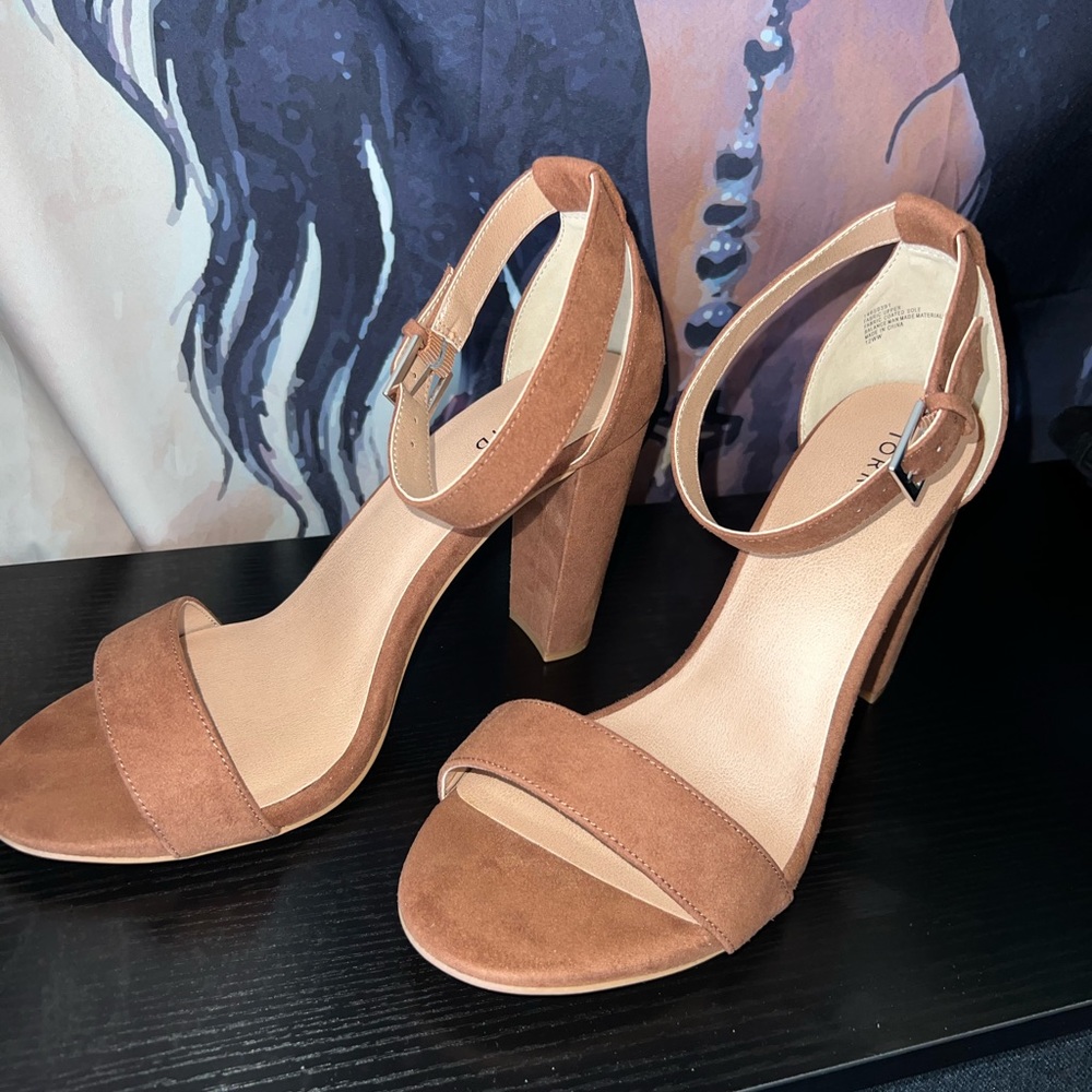 4 inch Brown tapered Heel size 12 wide